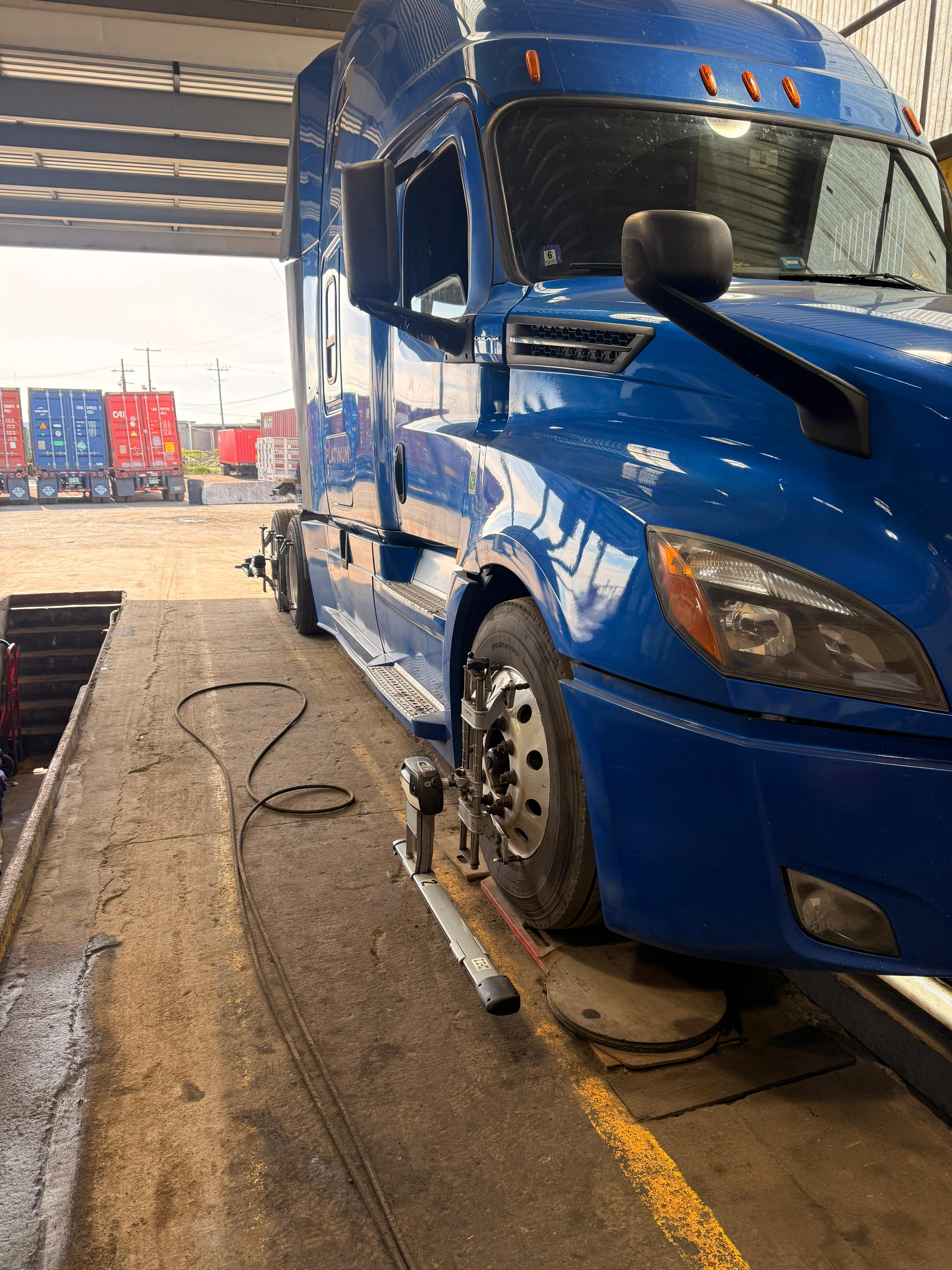 Open truck bay at Somet Truck Center for heavy-duty service